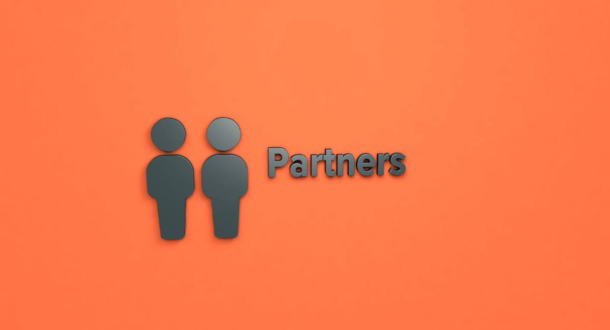 Orange background with word Partners in foreground